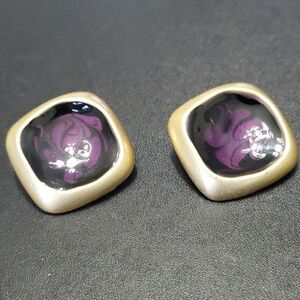 Gold tone black and purple swirly earrings